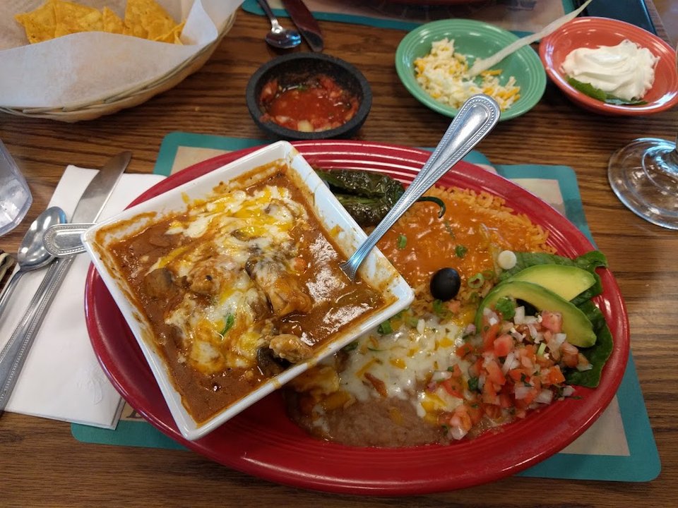 Specialty dishes and appetizers listed on a menu.